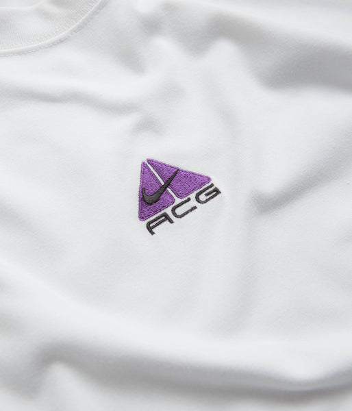 white purple and green nike shirt