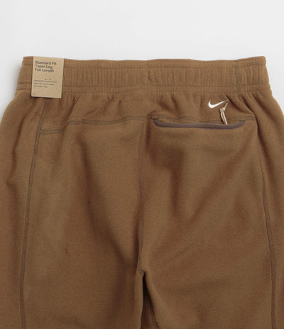 Nike ACG Wolf Tree Pants in Mosswood Brown and Summit White