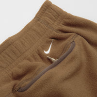 Nike ACG Wolf Tree Pants in Mosswood Brown and Summit White thumbnail