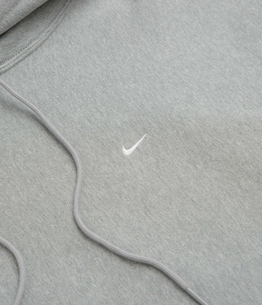 grey nike jumper with ticks all over