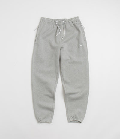 Nike Solo Swoosh Sweatpants in Dark Grey Heather and White