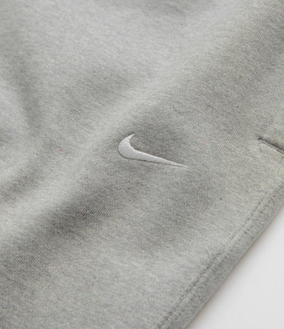 Nike Solo Swoosh Sweatpants in Dark Grey Heather and White