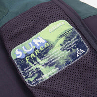Nike ACG Sun Farer Jacket in Faded Spruce and Gridiron / Black / Summit White thumbnail