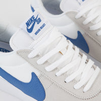 Nike SB Bruin React Shoes in Summit White and Signal Blue and Summit White thumbnail