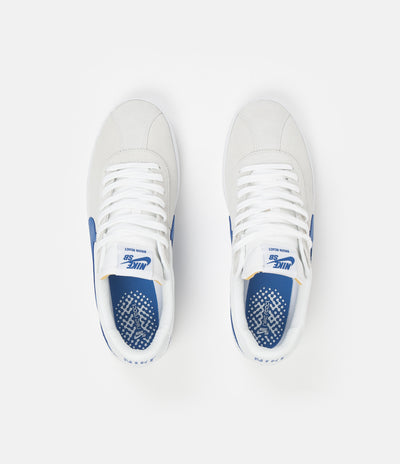 Nike SB Bruin React Shoes in Summit White and Signal Blue and Summit White