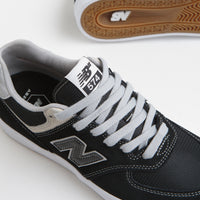 New Balance Numeric 574 Shoes in Black and Grey thumbnail