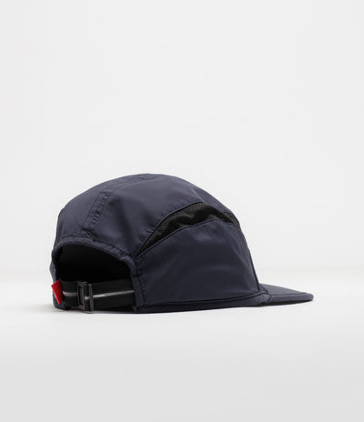 The Trilogy Tapes Clogged Bear Running Cap in Metallic Navy and Black