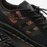 Adidas x Mike Arnold Handball Top Shoes in Core Black and Core Black / Semi Impact Orange thumbnail