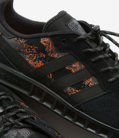 Adidas x Mike Arnold Handball Top Shoes in Core Black and Core Black / Semi Impact Orange