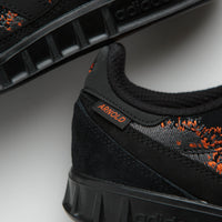 Adidas x Mike Arnold Handball Top Shoes in Core Black and Core Black / Semi Impact Orange thumbnail