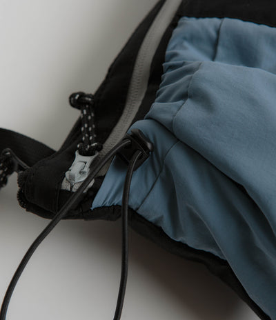 Butter Goods Pace Side Bag in Black and Blue