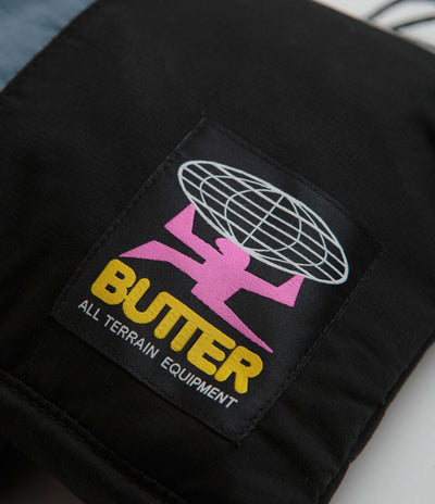 Butter Goods Pace Side Bag in Black and Blue