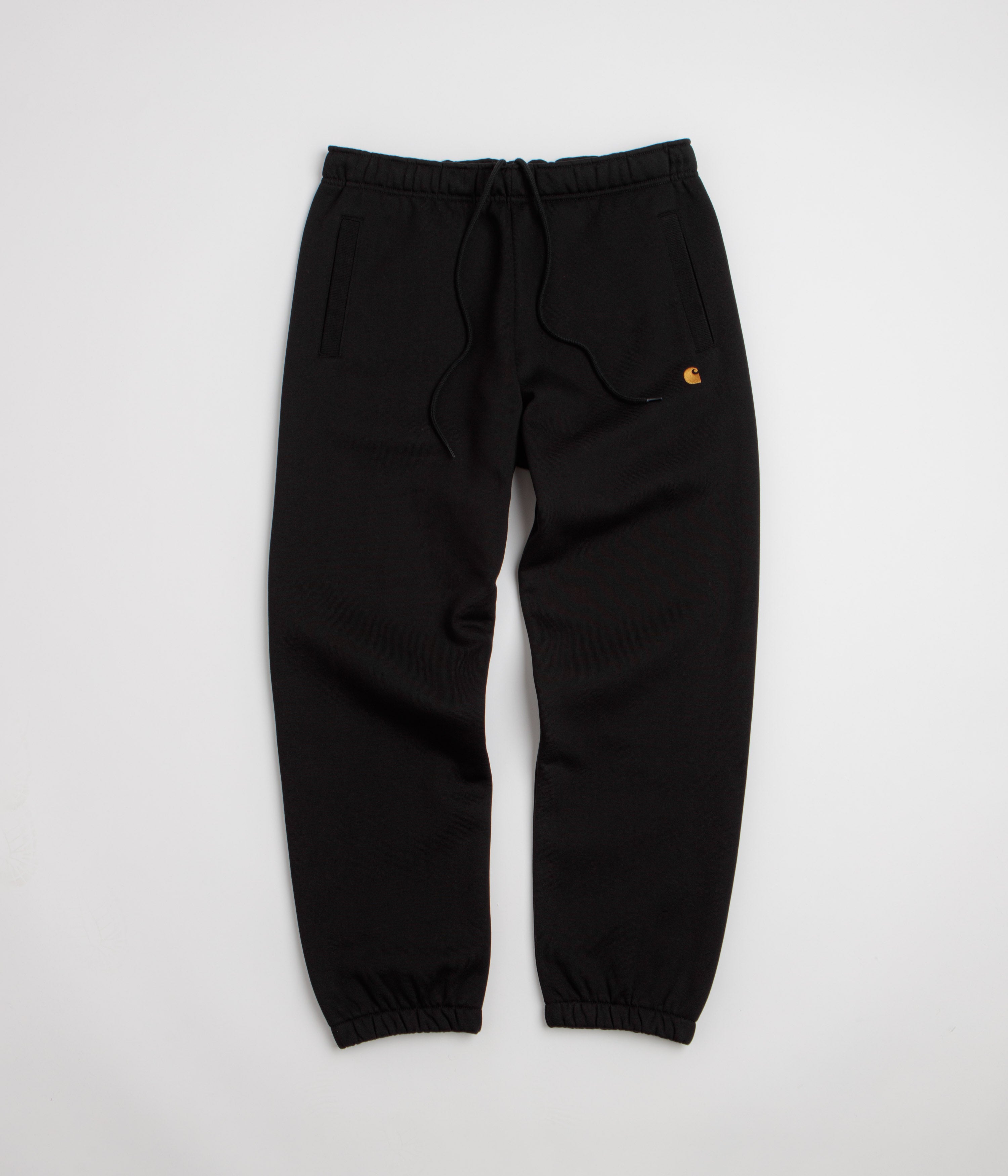 Carhartt Chase Sweatpants in Black and Black / Gold
