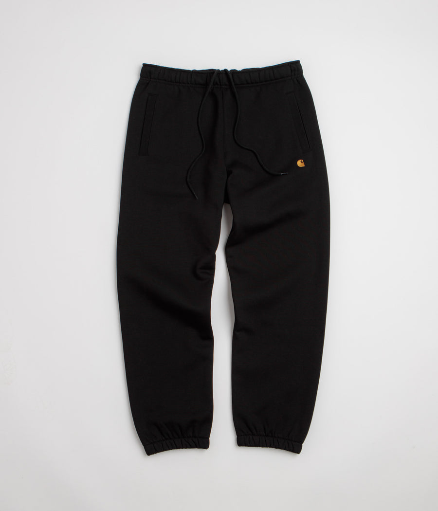 Carhartt Chase Sweatpants in Black and Black / Gold