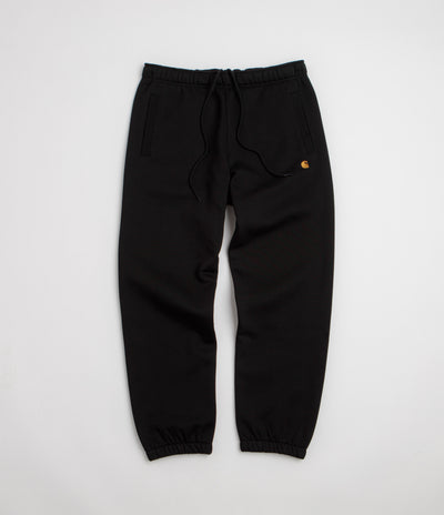 Carhartt Chase Sweatpants in Black and Black / Gold
