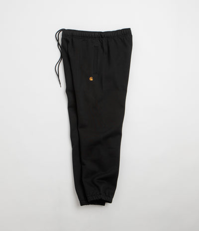 Carhartt Chase Sweatpants in Black and Black / Gold