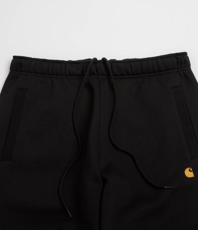 Carhartt Chase Sweatpants in Black and Black / Gold
