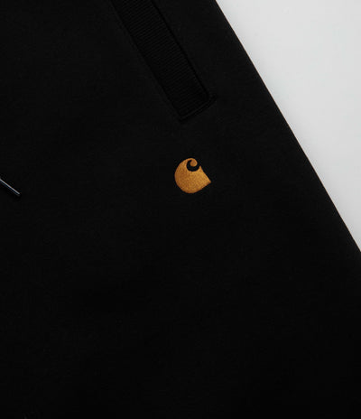 Carhartt Chase Sweatpants in Black and Black / Gold