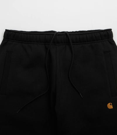 Carhartt Chase Sweatpants in Black and Black / Gold