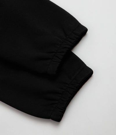 Carhartt Chase Sweatpants in Black and Black / Gold