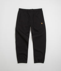 Carhartt Chase Sweatpants in Black and Gold