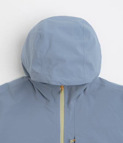 Cotopaxi Cielo Rain Jacket in Tempest and Moss