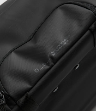 D_b_ Hugger 40L Carry-On Roller Bag in Black Out