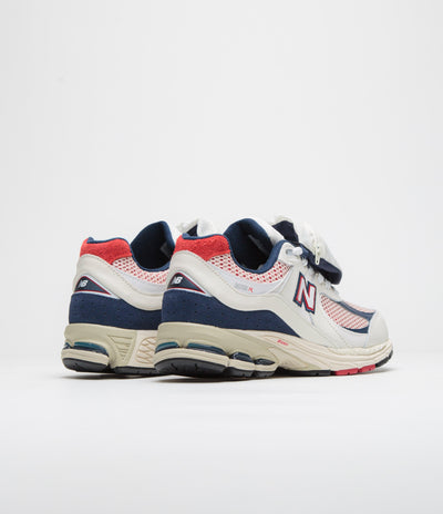 New Balance 2002R Shoes in Sea Salt and Red / Blue