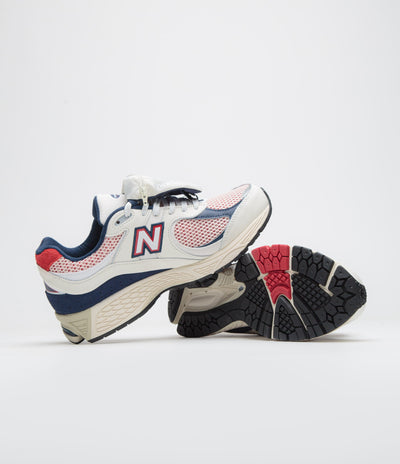 New Balance 2002R Shoes in Sea Salt and Red / Blue
