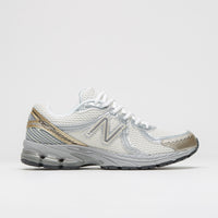 New Balance 860 Shoes in Sea Salt and Gold Metallic thumbnail