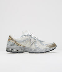 New Balance 860 Shoes in Sea Salt and Gold Metallic