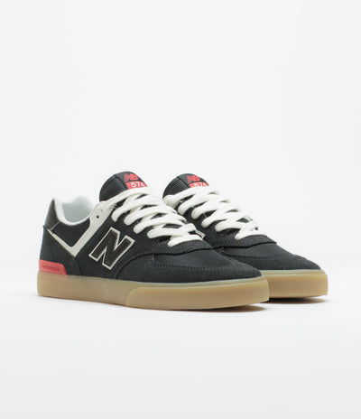 New Balance Numeric 574 Shoes in Black and White / Gum