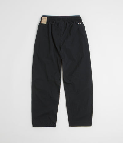 Nike ACG Black Iguana 2-in-1 Trousers in Black and Black / Summit White