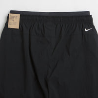 Nike ACG Black Iguana 2-in-1 Trousers in Black and Black / Summit White thumbnail
