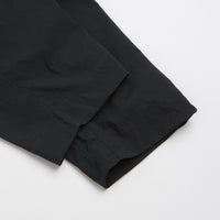 Nike ACG Black Iguana 2-in-1 Trousers in Black and Black / Summit White thumbnail