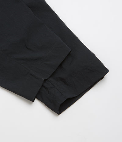 Nike ACG Black Iguana 2-in-1 Trousers in Black and Black / Summit White