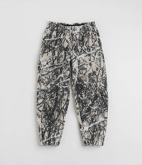 Nike ACG Canwell Glacier Windproof Pants in Light Orewood Brown and Black / Summit White
