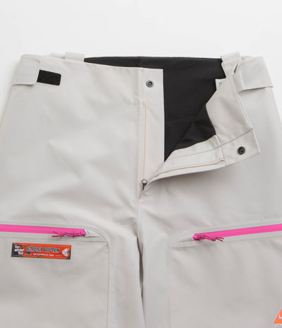 Nike ACG Chena Vortex Bib Pants in Light Orewood Brown and Anthracite / Summit White