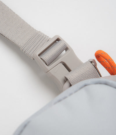 Nike ACG Daymax Crossbody Bag in College Grey and Grey Fog / Safety Orange