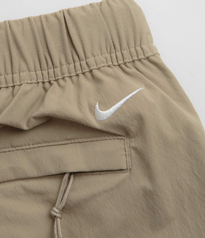 Nike ACG Hiking Pants in Khaki and Light Iron Ore / Summit White