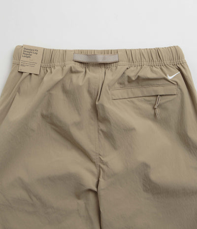 Nike ACG Hiking Pants in Khaki and Light Iron Ore / Summit White