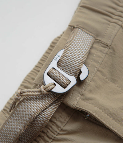 Nike ACG Hiking Pants in Khaki and Light Iron Ore / Summit White