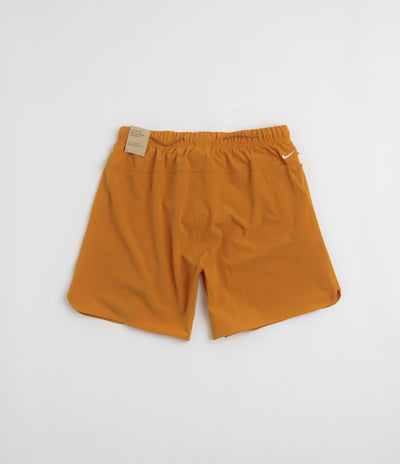 Nike ACG New Sands Shorts in Monarch and Dark Russet / Summit White