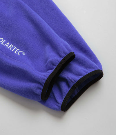 Nike ACG Polartec Wolf Tree Pants in Persian Violet and Summit White
