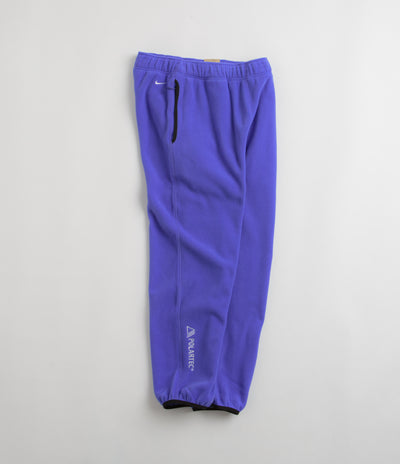 Nike ACG Polartec Wolf Tree Pants in Persian Violet and Summit White