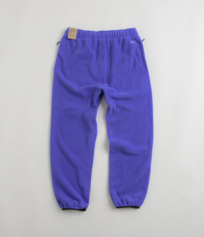 Nike ACG Polartec Wolf Tree Pants in Persian Violet and Summit White