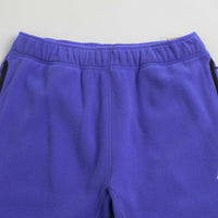 Nike ACG Polartec Wolf Tree Pants in Persian Violet and Summit White thumbnail