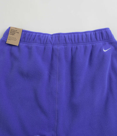 Nike ACG Polartec Wolf Tree Pants in Persian Violet and Summit White