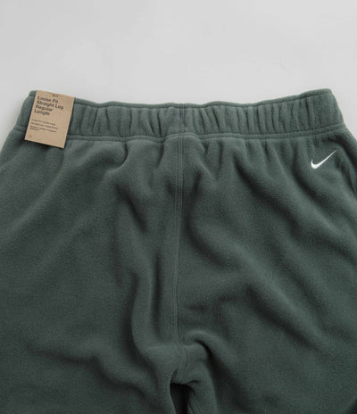 Nike ACG Polartec Wolf Tree Pants in Vintage Green and Bicoastal / Summit White