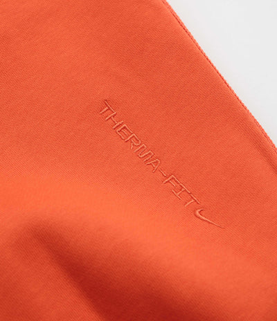 Nike ACG Therma-FIT Fleece Hoodie in Picante Red and Cinnamon / Summit White